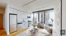 Image for West 54th St High-Floor 2BR with Striking River & Garden Views | Rent Stabilized & NO Broker's Fees